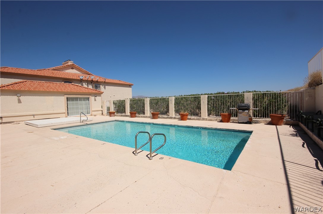3408 Sunriver Road, Unit 109 Bullhead City, AZ 86429 - Photo 22 of 23 swimming pool view with a seating space