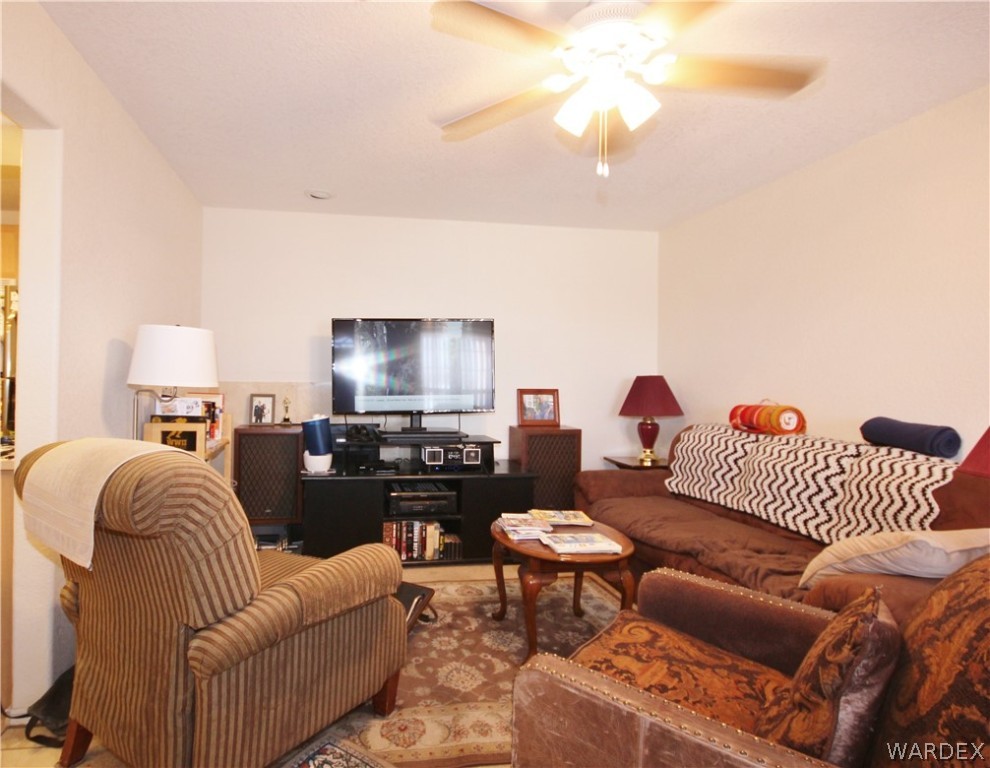3408 Sunriver Road, Unit 109 Bullhead City, AZ 86429 - Photo 6 of 23 a living room with furniture