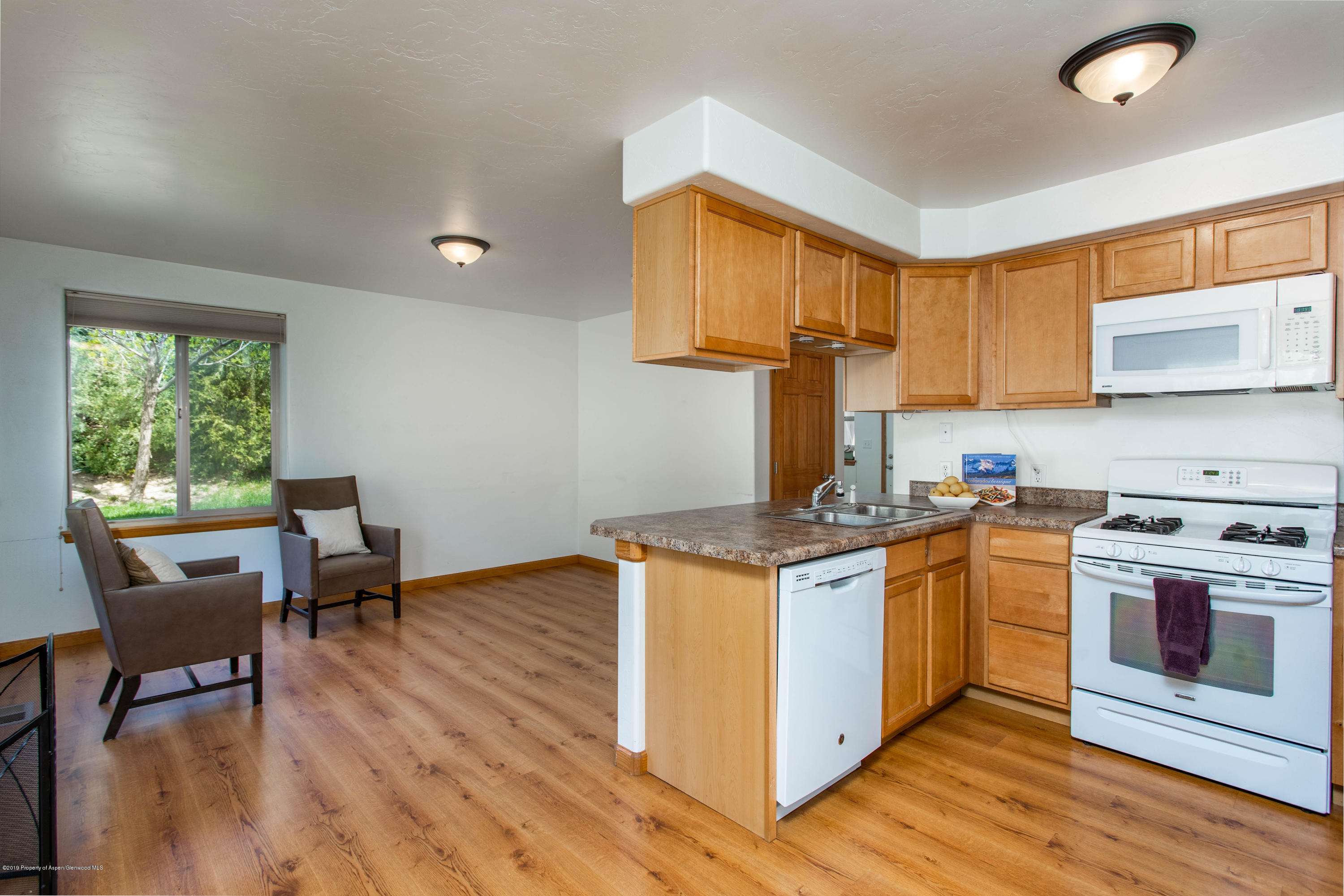 3109 Howard Avenue Rifle, CO 81650 - Photo 3 of 18 Kitchen and Living Area