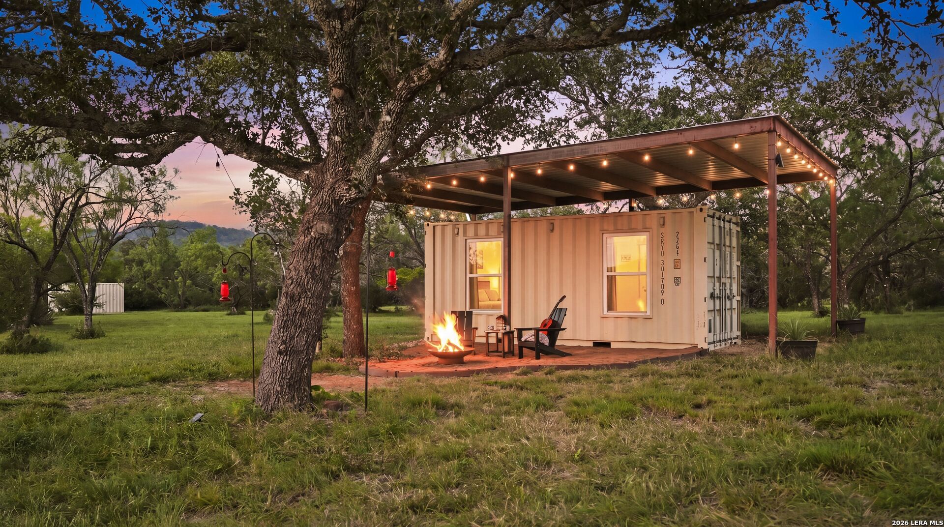 3402 Mormon Mill Road Marble Falls, TX 78654 - Photo 2 of 29 a view of yard with green space and porch