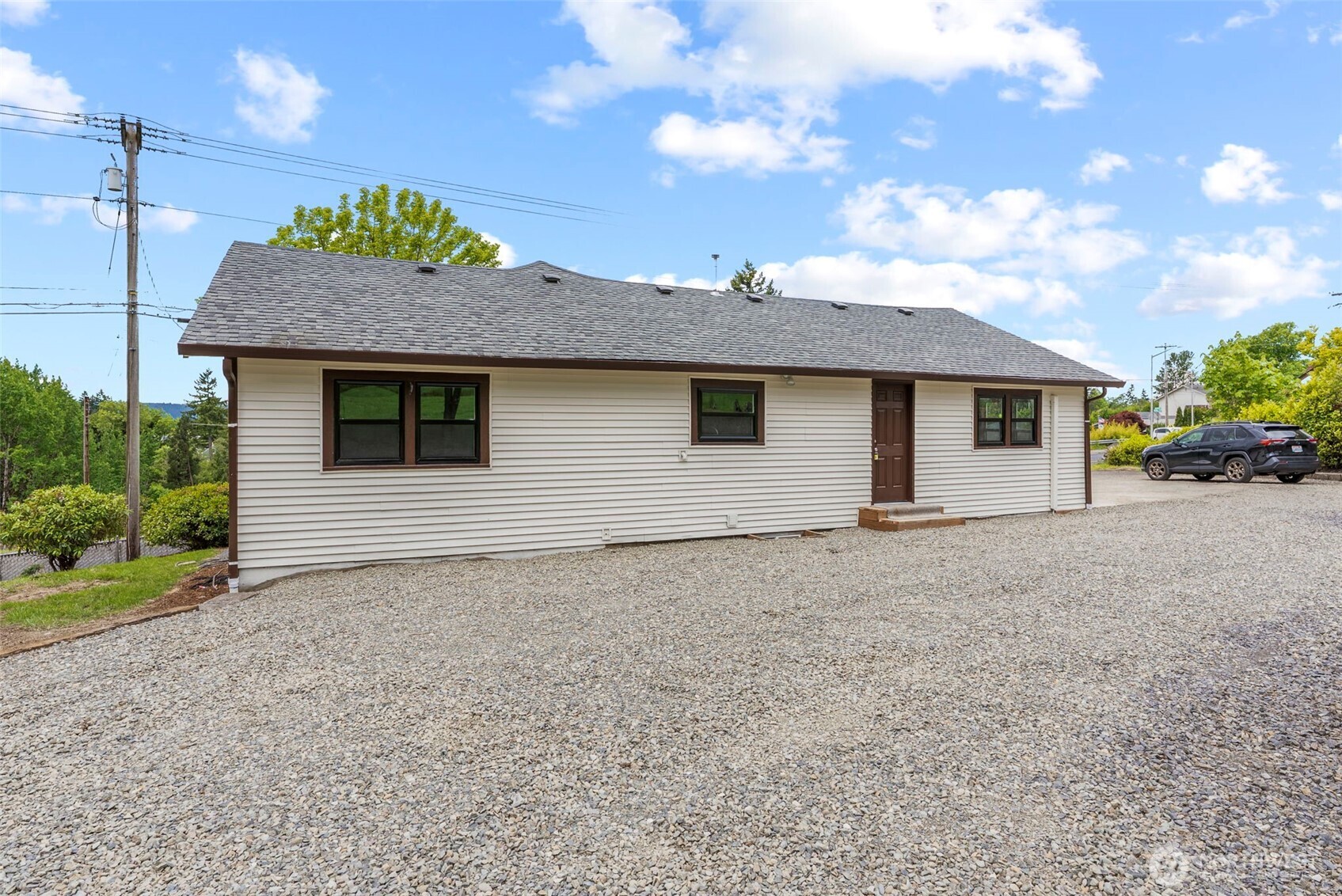 2914 Columbia Heights Road Longview, WA 98632 - Photo 24 of 29 a view of a house with a backyard