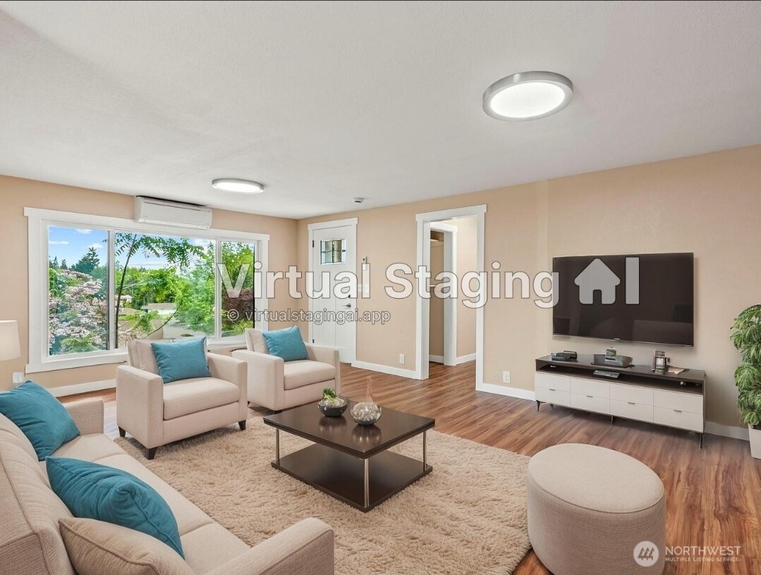 2914 Columbia Heights Road Longview, WA 98632 - Photo 3 of 29 a living room with furniture and a flat screen tv
