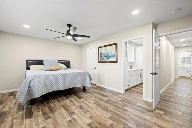 a bedroom with a bed and a closet