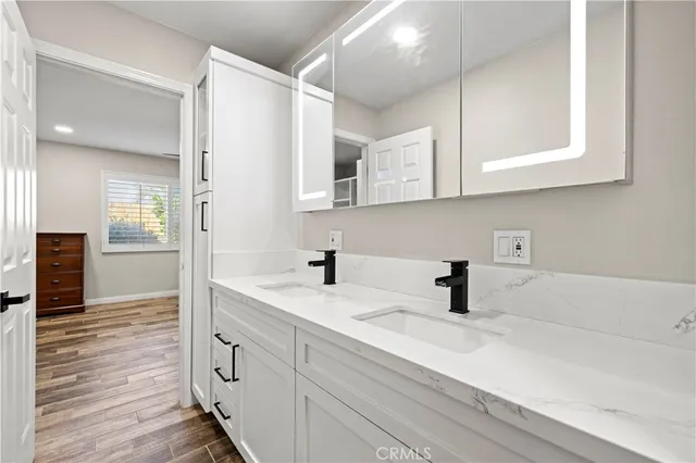 a view of a chairs and table in patio