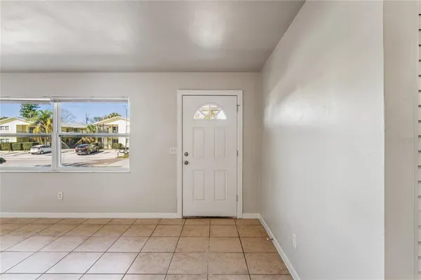 a view of an empty room and window