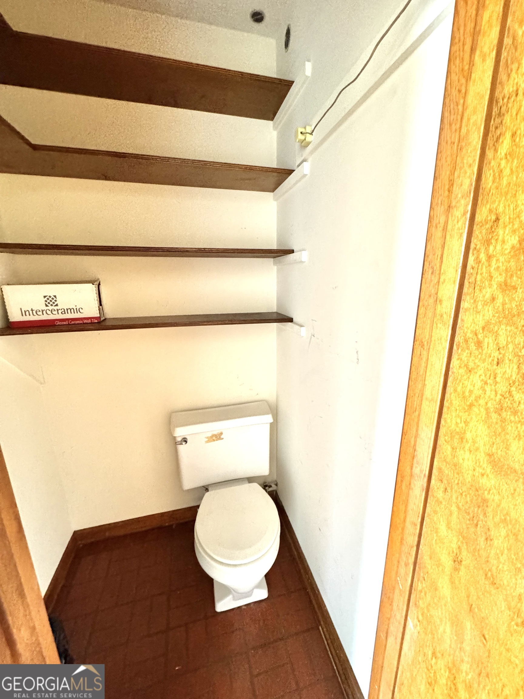 1760 Fears Road Rutledge, GA 30663 - Photo 31 of 68 a bathroom with a toilet and a sink