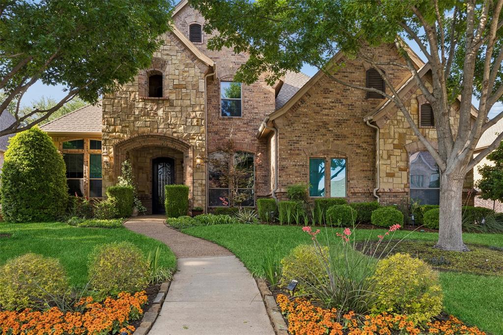 1608 Tuscan Ridge Circle Southlake, TX 76092 - Photo 1 of 36 a front view of a house with yard and green space