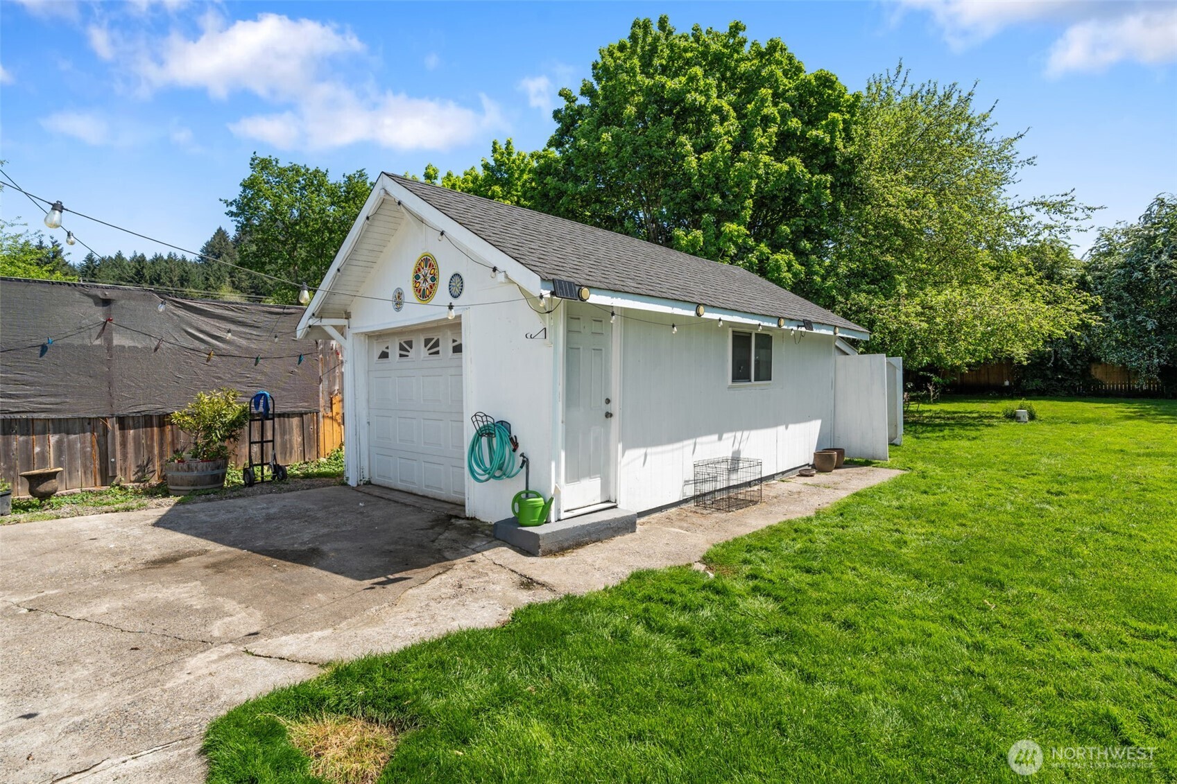 226 Southwest 16th Street Chehalis, WA 98532 - Photo 24 of 38 a front view of a house with a garden and yard