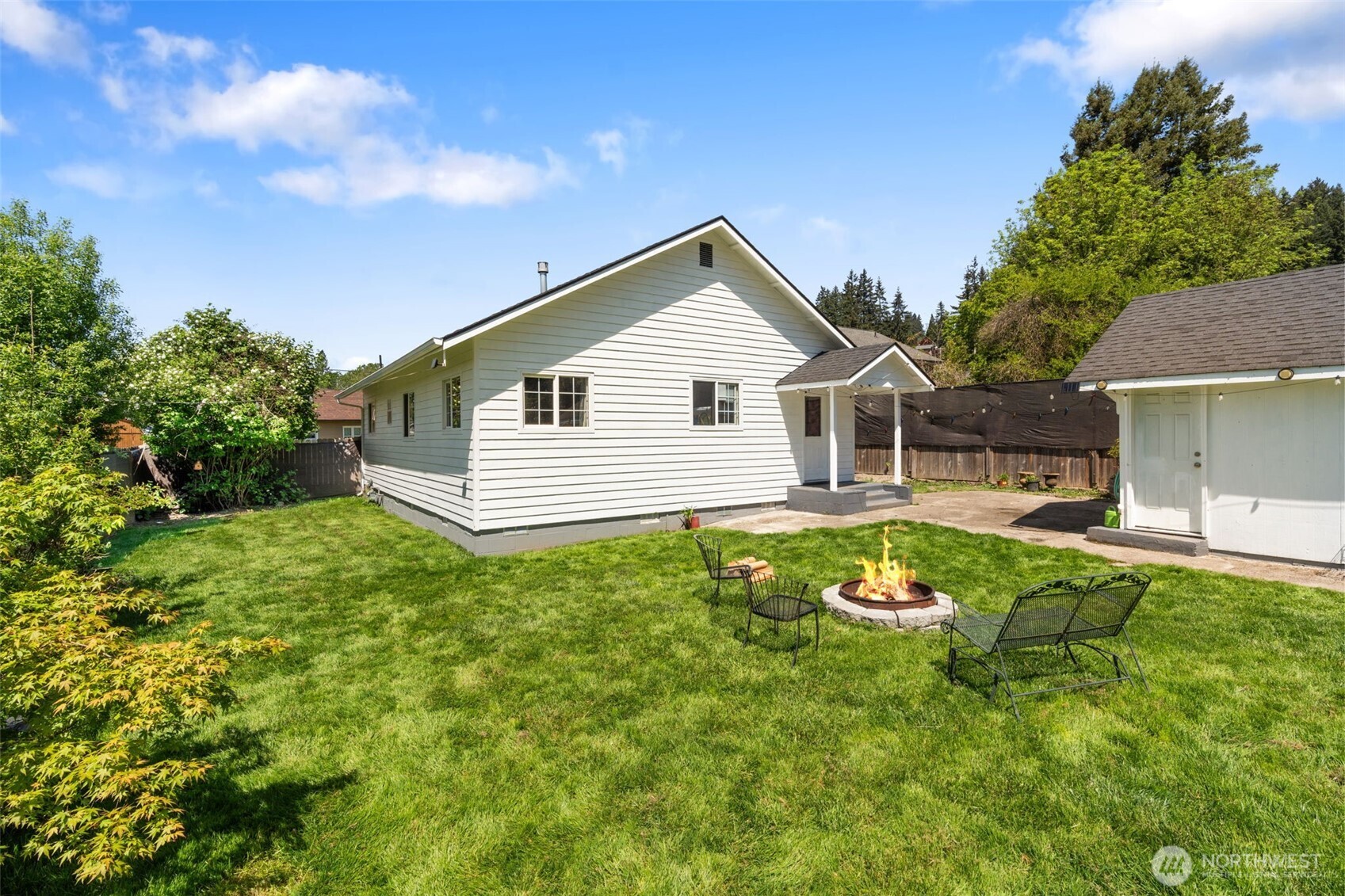 226 Southwest 16th Street Chehalis, WA 98532 - Photo 25 of 38 a view of a house with a yard and sitting area
