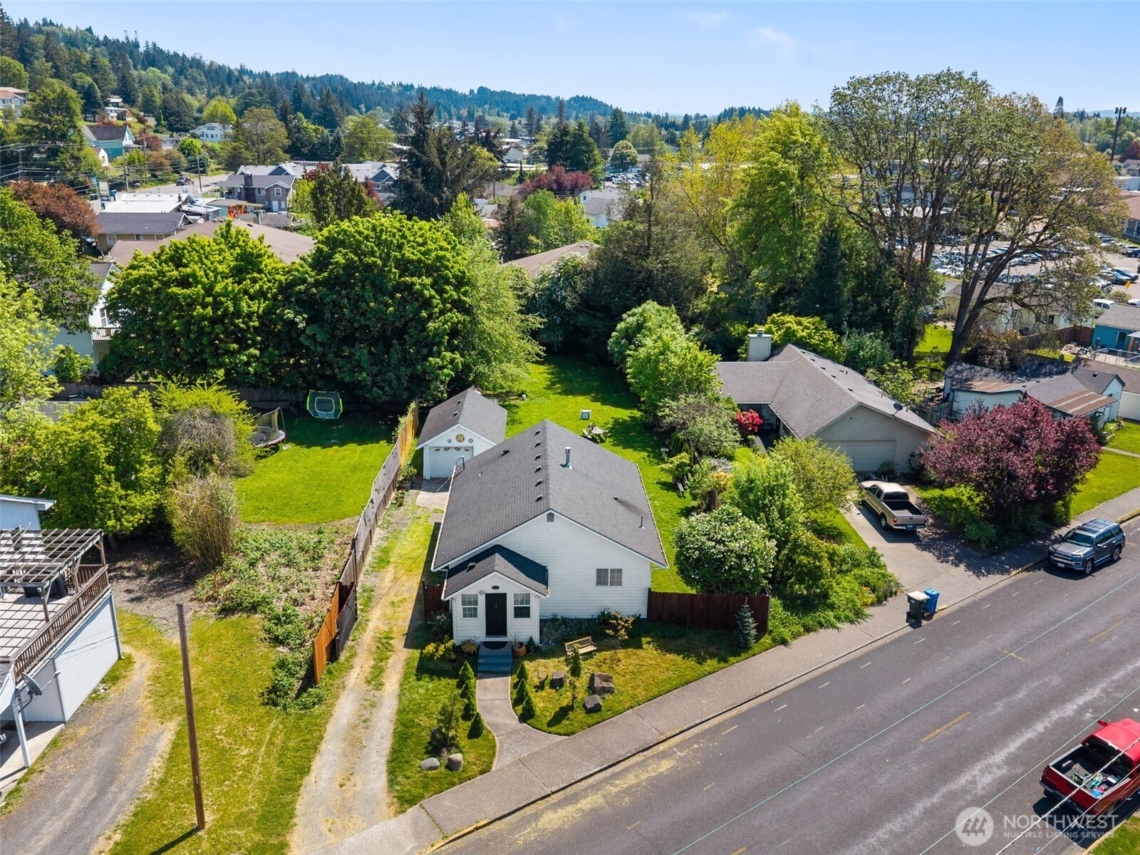 226 Southwest 16th Street Chehalis, WA 98532 - Photo 32 of 38 an aerial view of multiple houses with yard