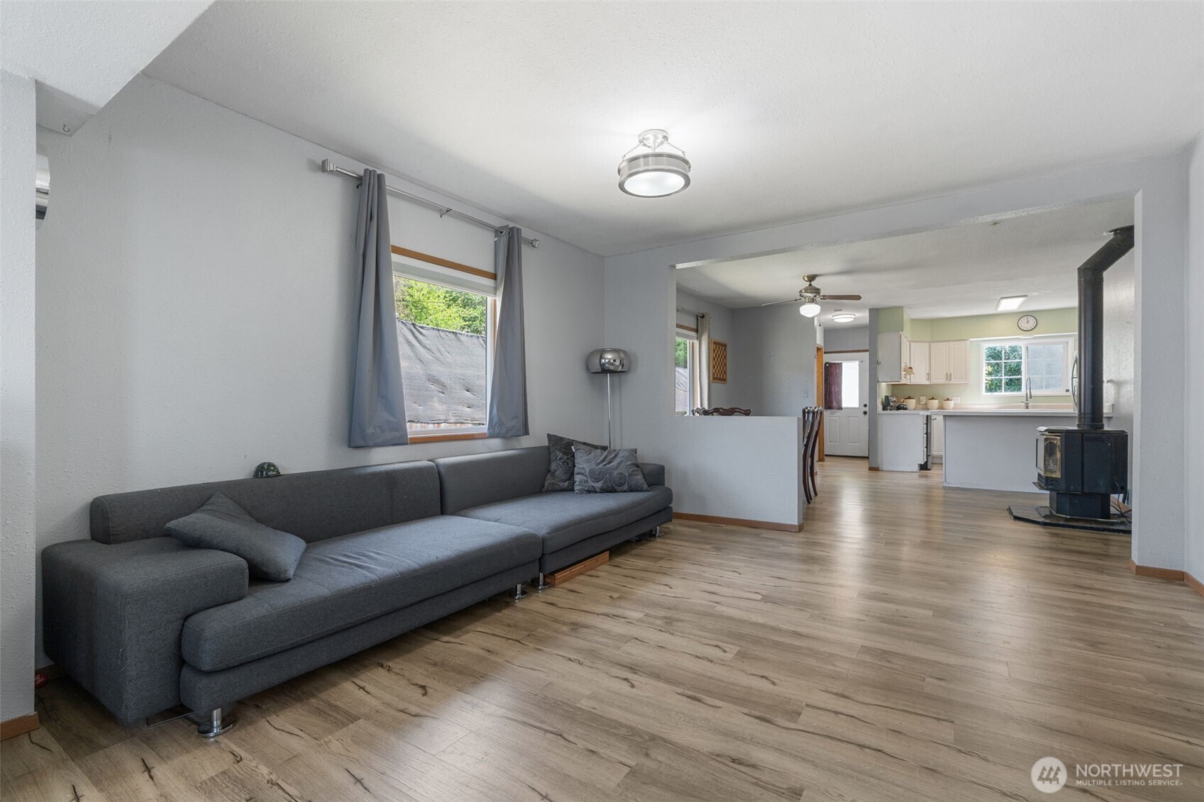 226 Southwest 16th Street Chehalis, WA 98532 - Photo 5 of 38 a living room with furniture and a wooden floor