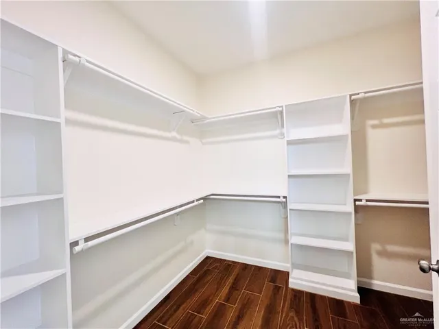 a view of an empty walk in closet