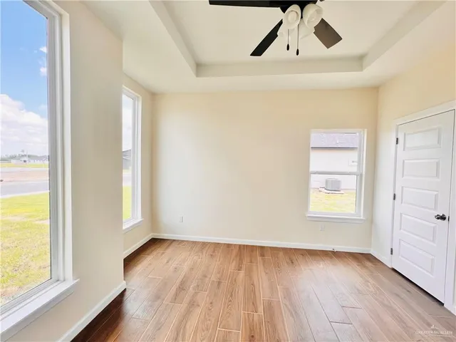 a view of an empty room and window