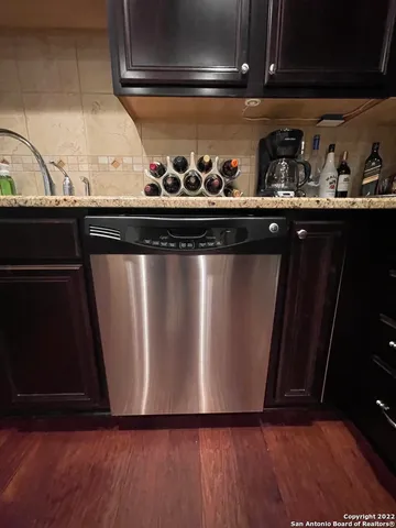 a close view of stove and cabinets