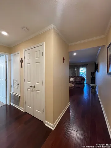a view of a living room and hardwood floor