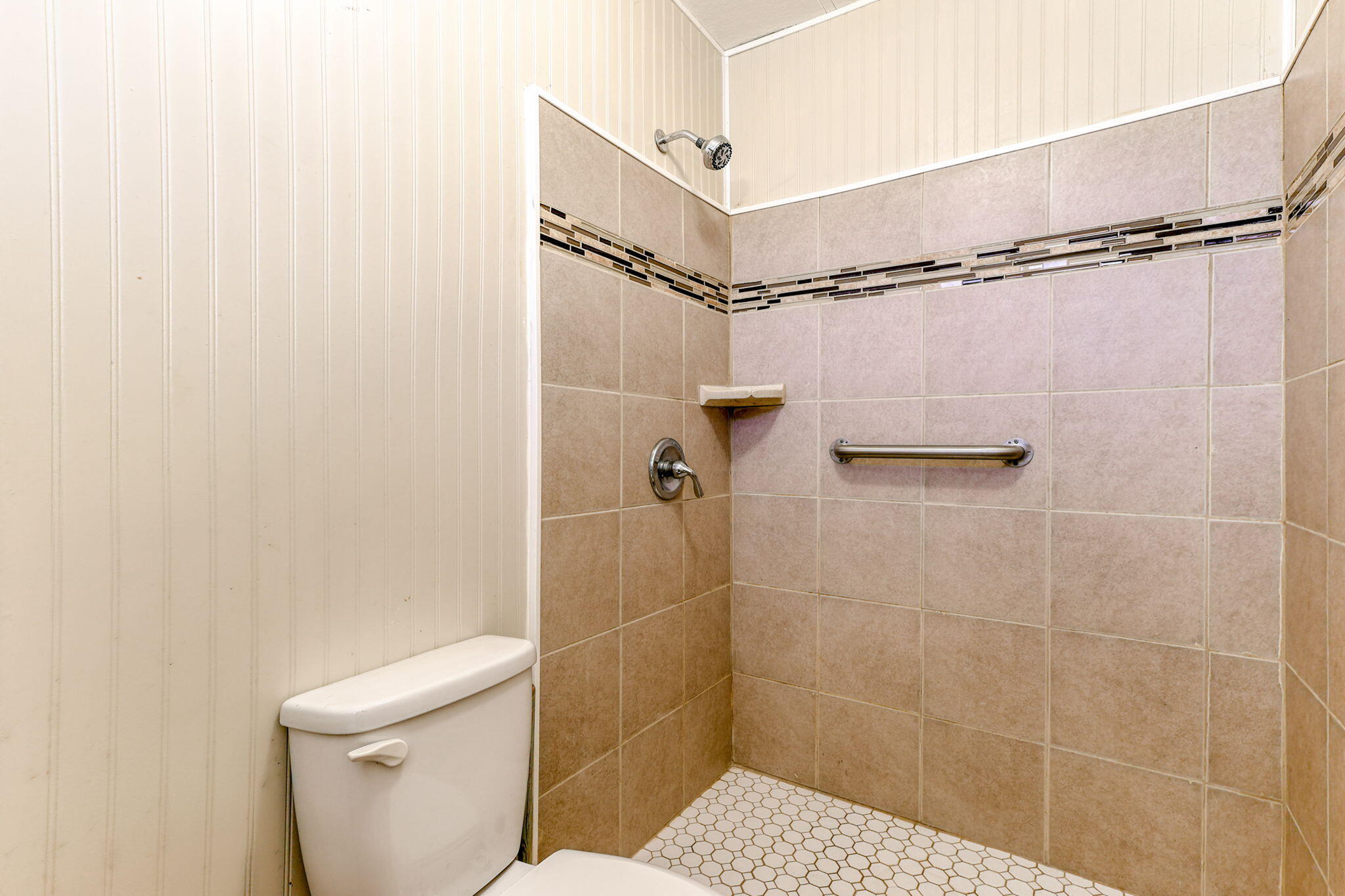 5082 Happy Valley Road Anderson, CA 96007 - Photo 23 of 66 a bathroom with a toilet and a shower