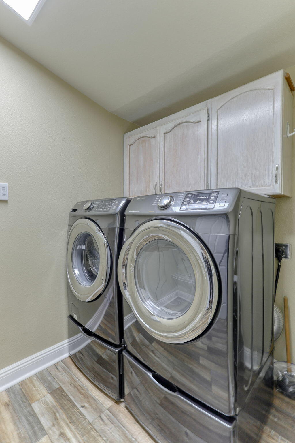5082 Happy Valley Road Anderson, CA 96007 - Photo 50 of 66 a utility room with sink dryer and washer