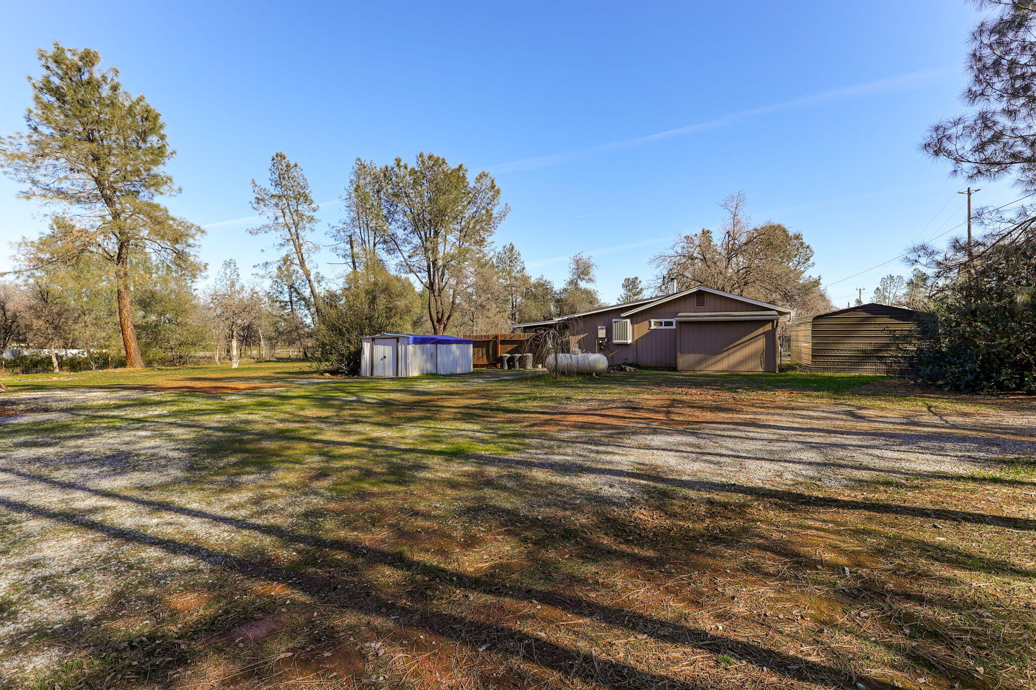 5082 Happy Valley Road Anderson, CA 96007 - Photo 60 of 66 a front view of a house with a yard