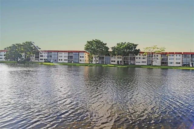 a view of a lake with houses