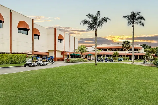 a view of a chairs and table in the patio