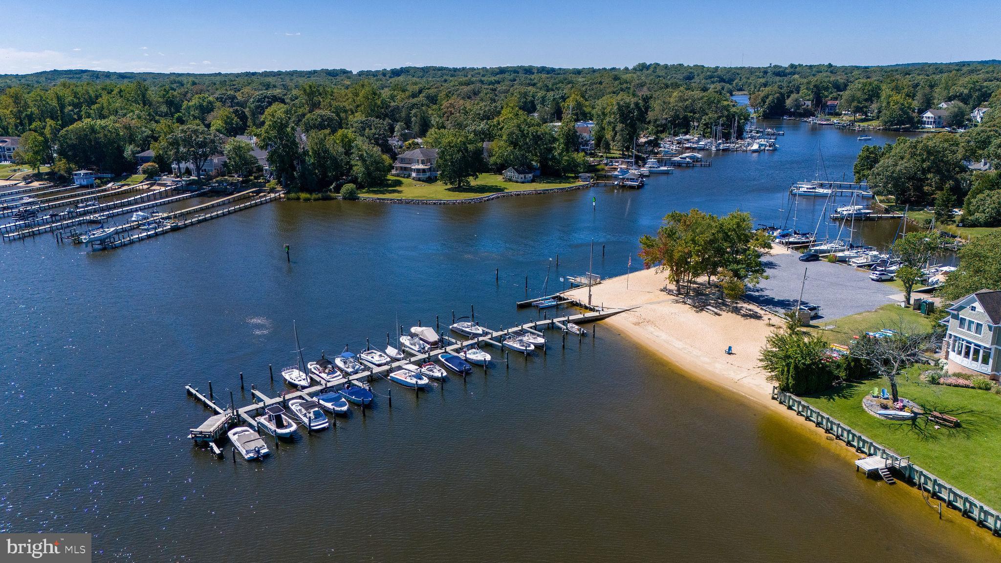 9 Beach Road Severna Park, MD 21146 - Photo 2 of 58 an aerial view of a house with a yard and lake view