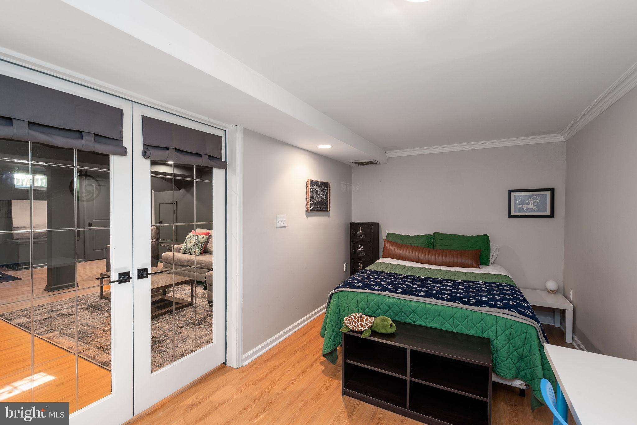 9 Beach Road Severna Park, MD 21146 - Photo 29 of 58 a bedroom with furniture and a window