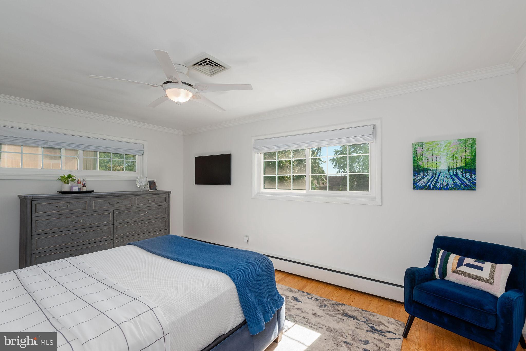 9 Beach Road Severna Park, MD 21146 - Photo 36 of 58 a bed room with a bed and a mirror