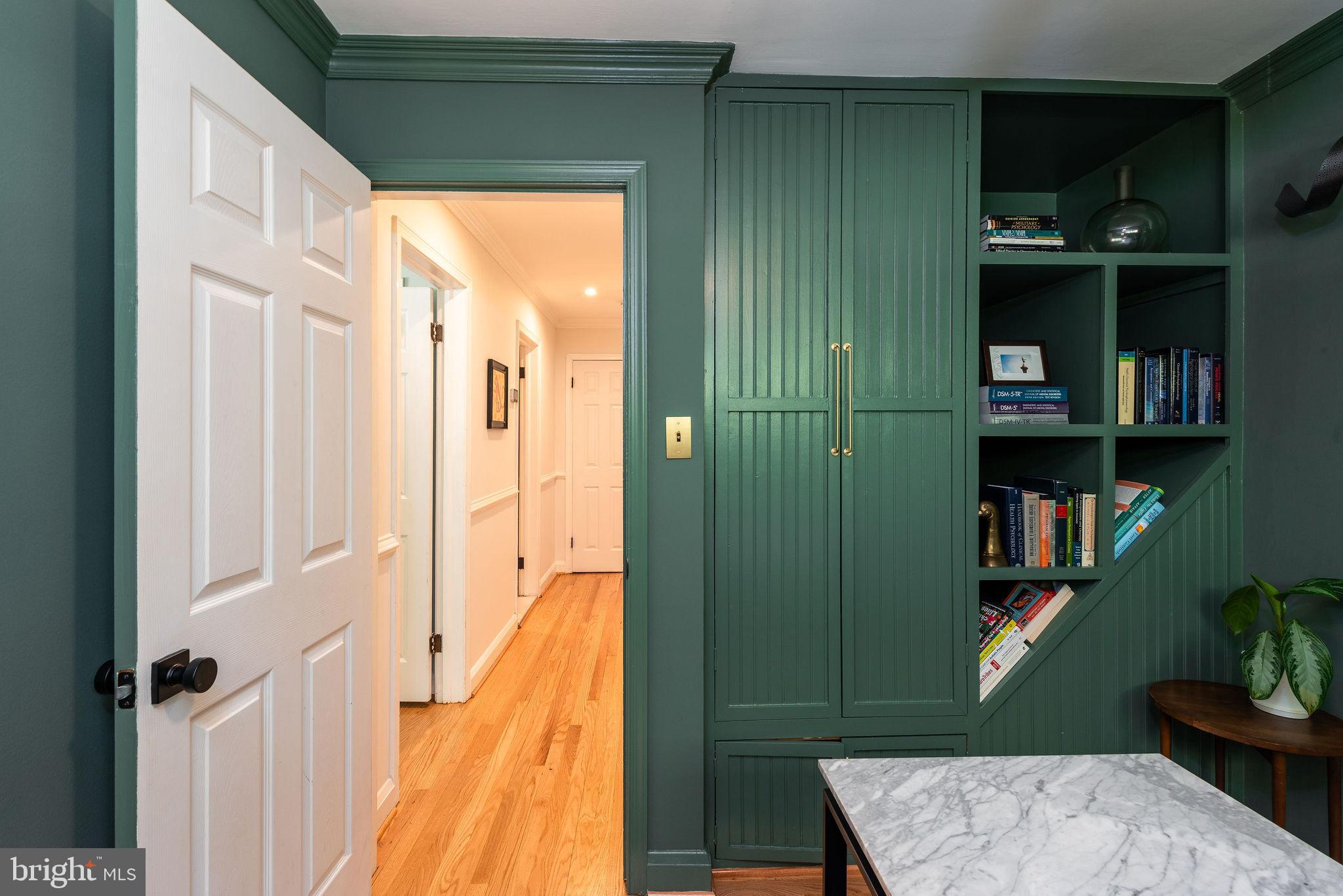 9 Beach Road Severna Park, MD 21146 - Photo 43 of 58 a view of a hallway with wooden shelves