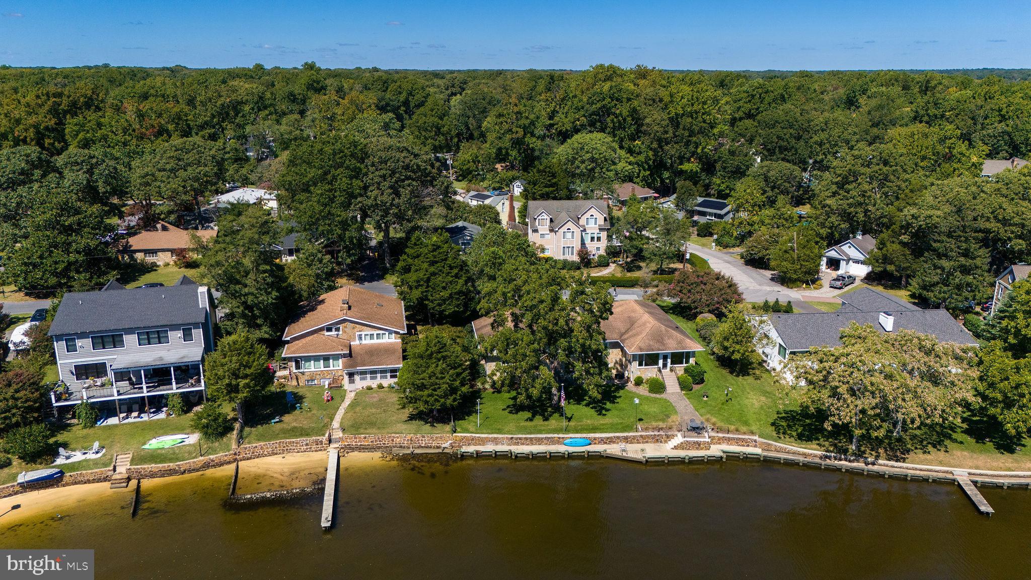 9 Beach Road Severna Park, MD 21146 - Photo 8 of 58 an aerial view of a house with a yard and lake view
