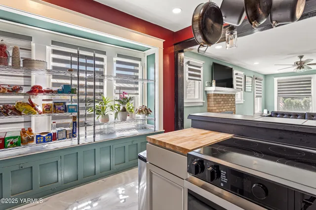 a kitchen with a stove and a microwave