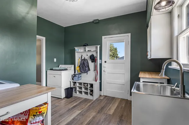 a view of a bathroom from a hallway