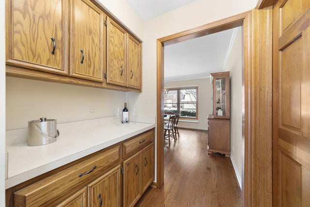 1940 Slippery Rock Road Naperville, IL 60565 - Photo 13 of 28 a kitchen with a sink and cabinets