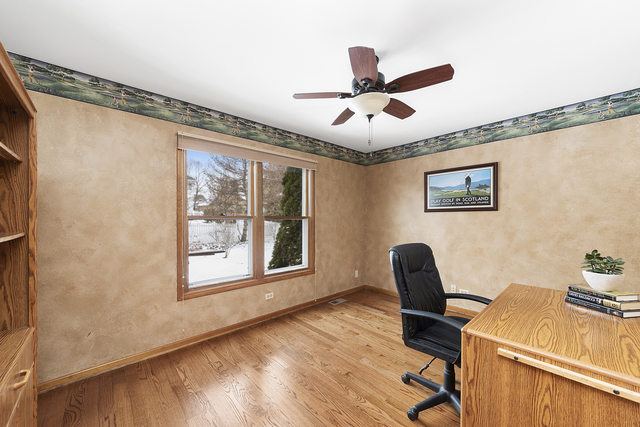 1940 Slippery Rock Road Naperville, IL 60565 - Photo 14 of 28 a view of a workspace with furniture and a window