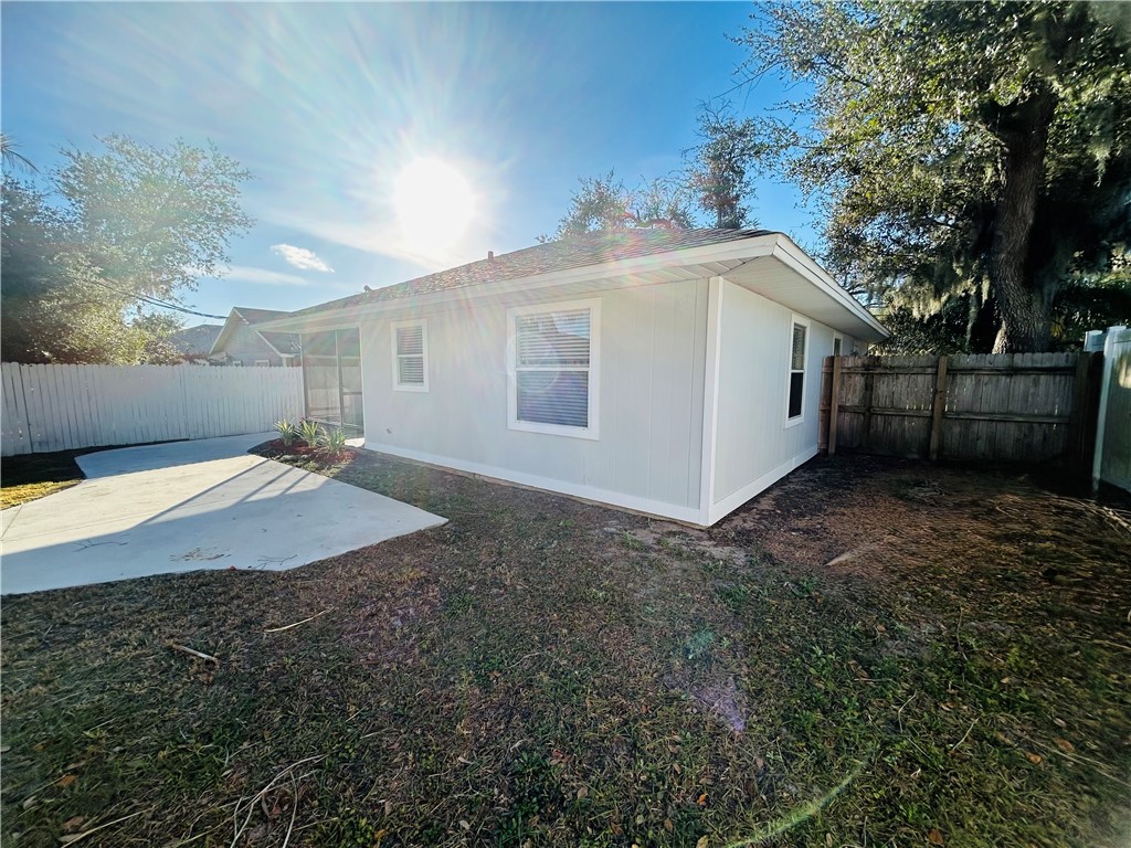 224 Georgia Street Vero Beach, FL 32962 - Photo 21 of 23 a view of a house with a yard