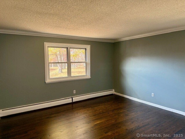 498 Oak Avenue, Unit 28 Cheshire, CT 06410 - Photo 17 of 21 a view of a room with wooden floor and a window