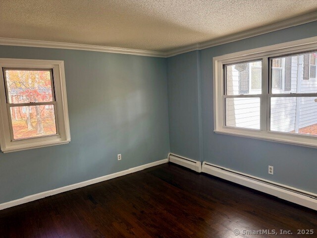 498 Oak Avenue, Unit 28 Cheshire, CT 06410 - Photo 18 of 21 a view of a room with wooden floor and a window