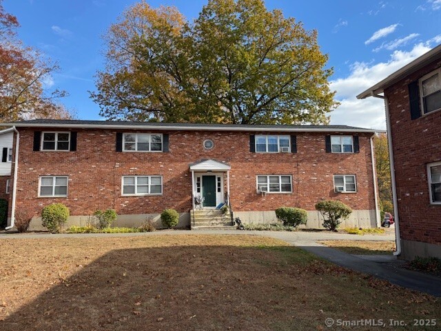 498 Oak Avenue, Unit 28 Cheshire, CT 06410 - Photo 2 of 21 front view of a house with a yard