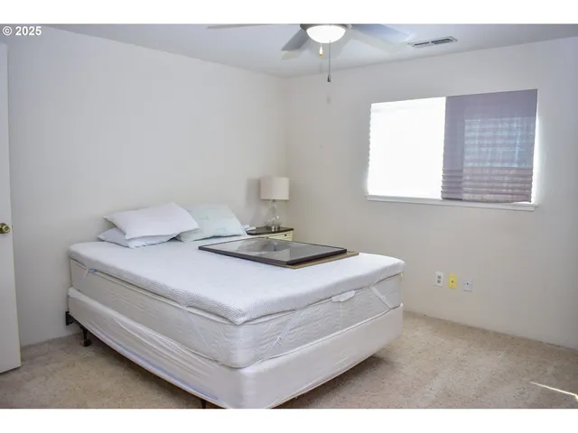 a room with closet and wooden floor