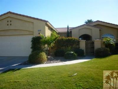 68433 Riviera Road Cathedral City, CA 92234 - Photo 1 of 21 a front view of a house with garden