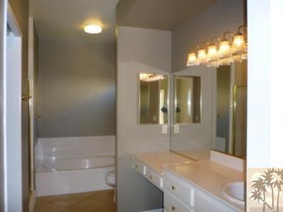 68433 Riviera Road Cathedral City, CA 92234 - Photo 9 of 21 a bathroom with a sink and a mirror
