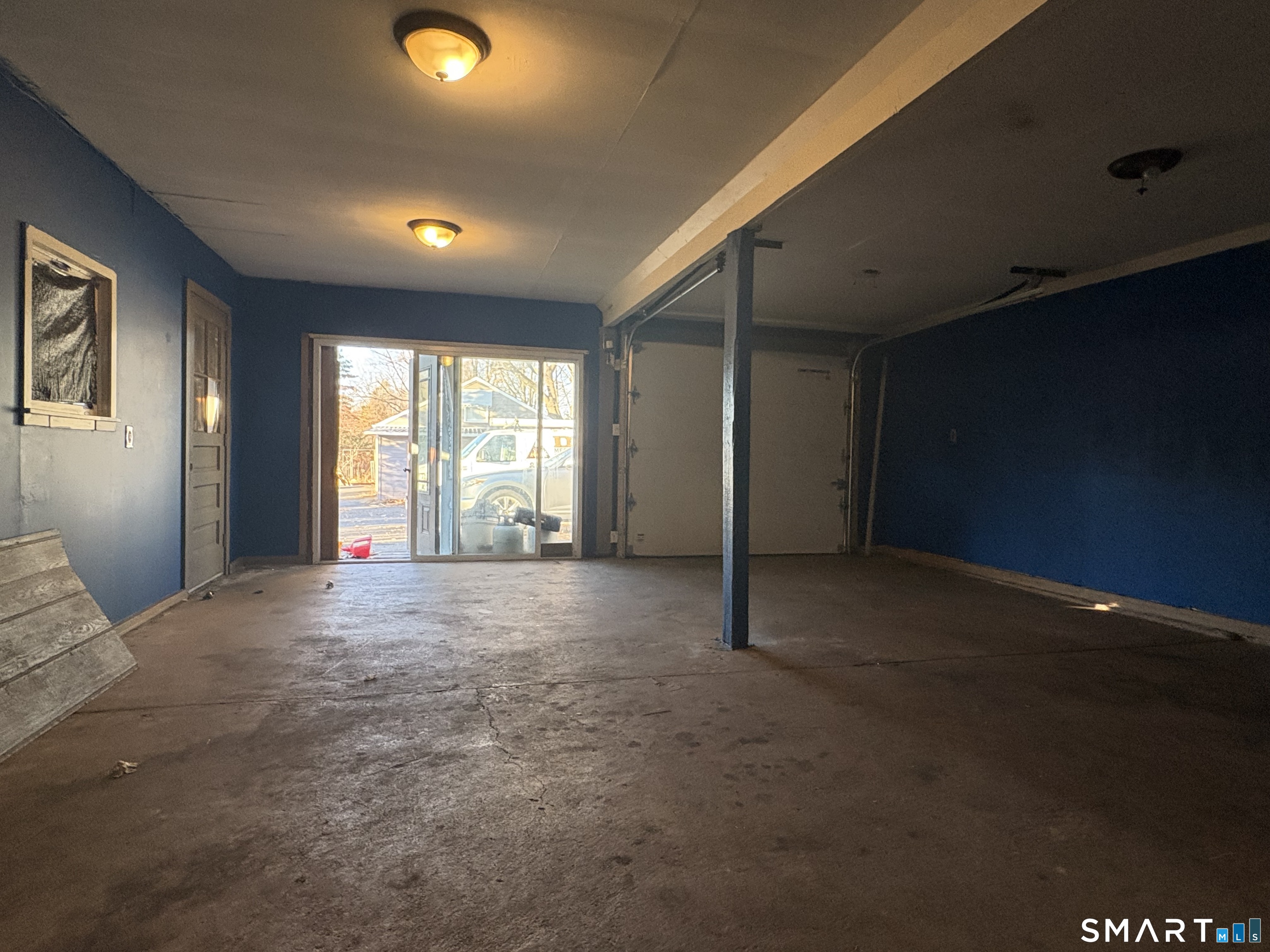 199 West Center Street, Unit FRONT Manchester, CT 06040 - Photo 5 of 9 a view of an empty room with a window