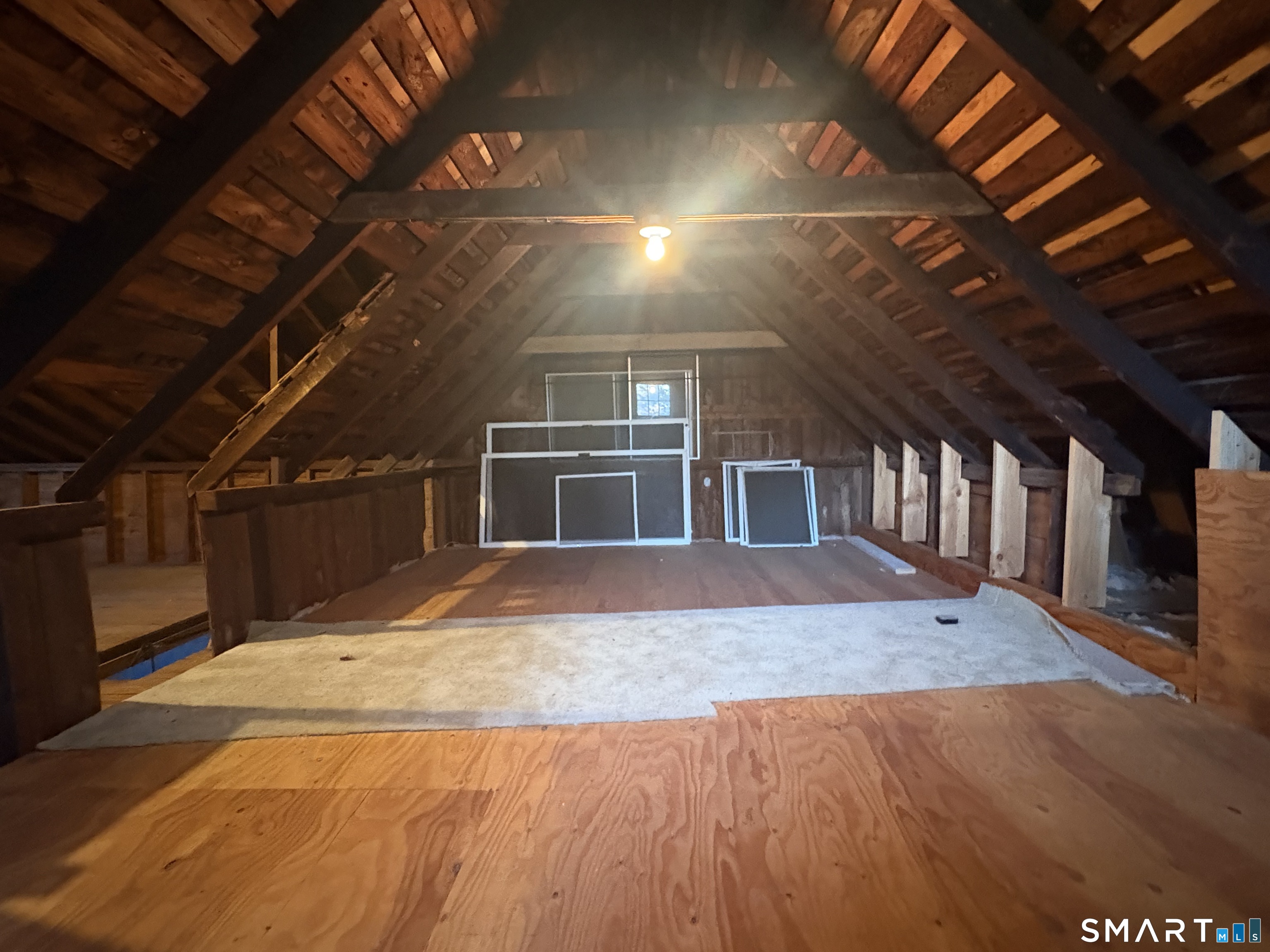 199 West Center Street, Unit FRONT Manchester, CT 06040 - Photo 8 of 9 a view of a hall with wooden floor