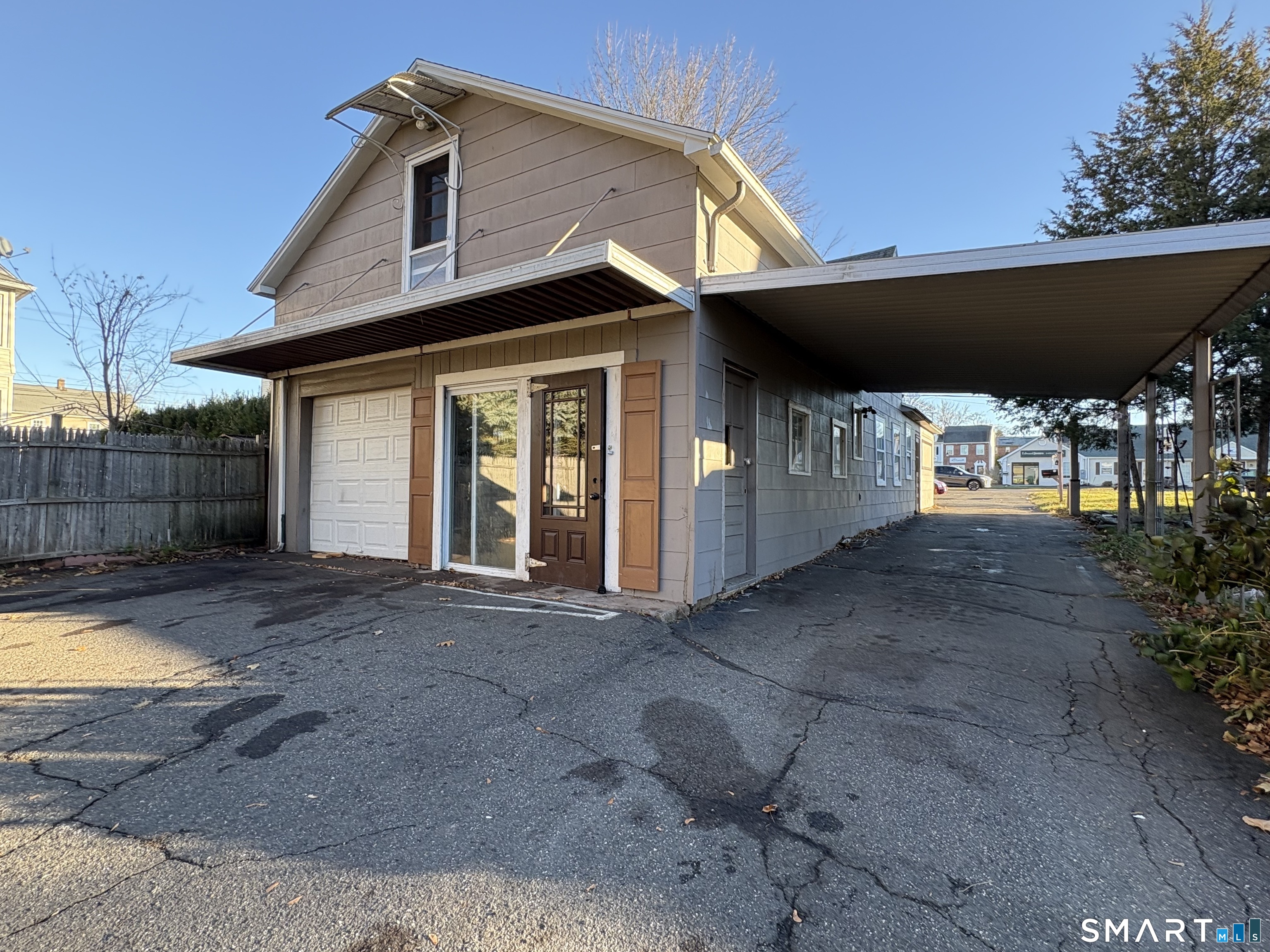 199 West Center Street, Unit FRONT Manchester, CT 06040 - Photo 9 of 9 a view of a house with backyard and balcony