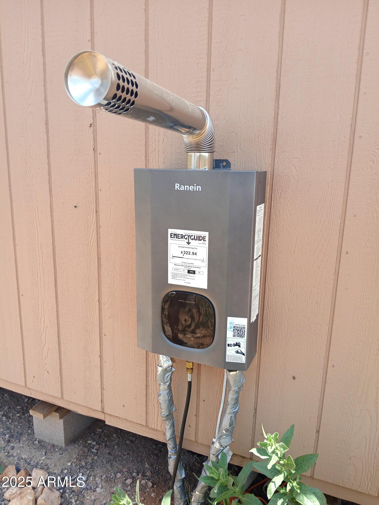3283 C. Los Vientos Douglas, AZ 85607 - Photo 13 of 20 a view of a hallway with washer and dryer