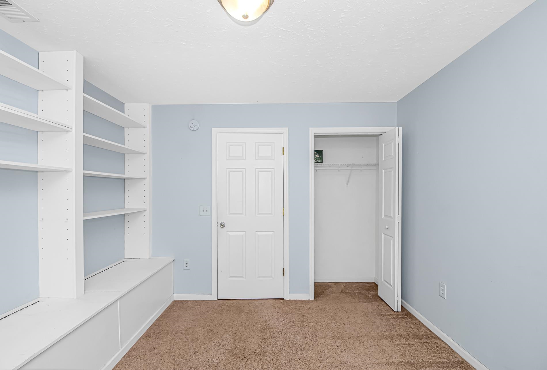 1012 Cadbury Court Conway, SC 29527 - Photo 17 of 40 Unfurnished bedroom featuring carpet, a textured ceiling, and a closet