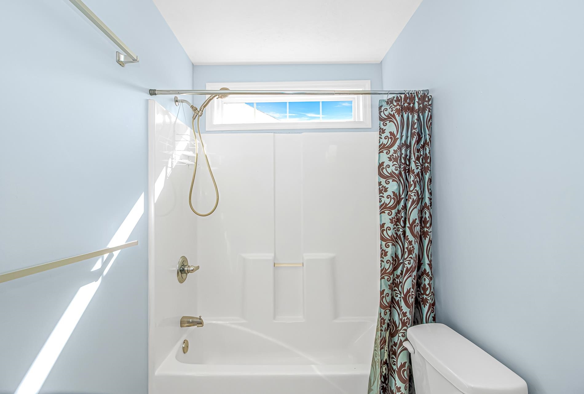 1012 Cadbury Court Conway, SC 29527 - Photo 23 of 40 Full bath featuring shower / bath combo with shower curtain and toilet