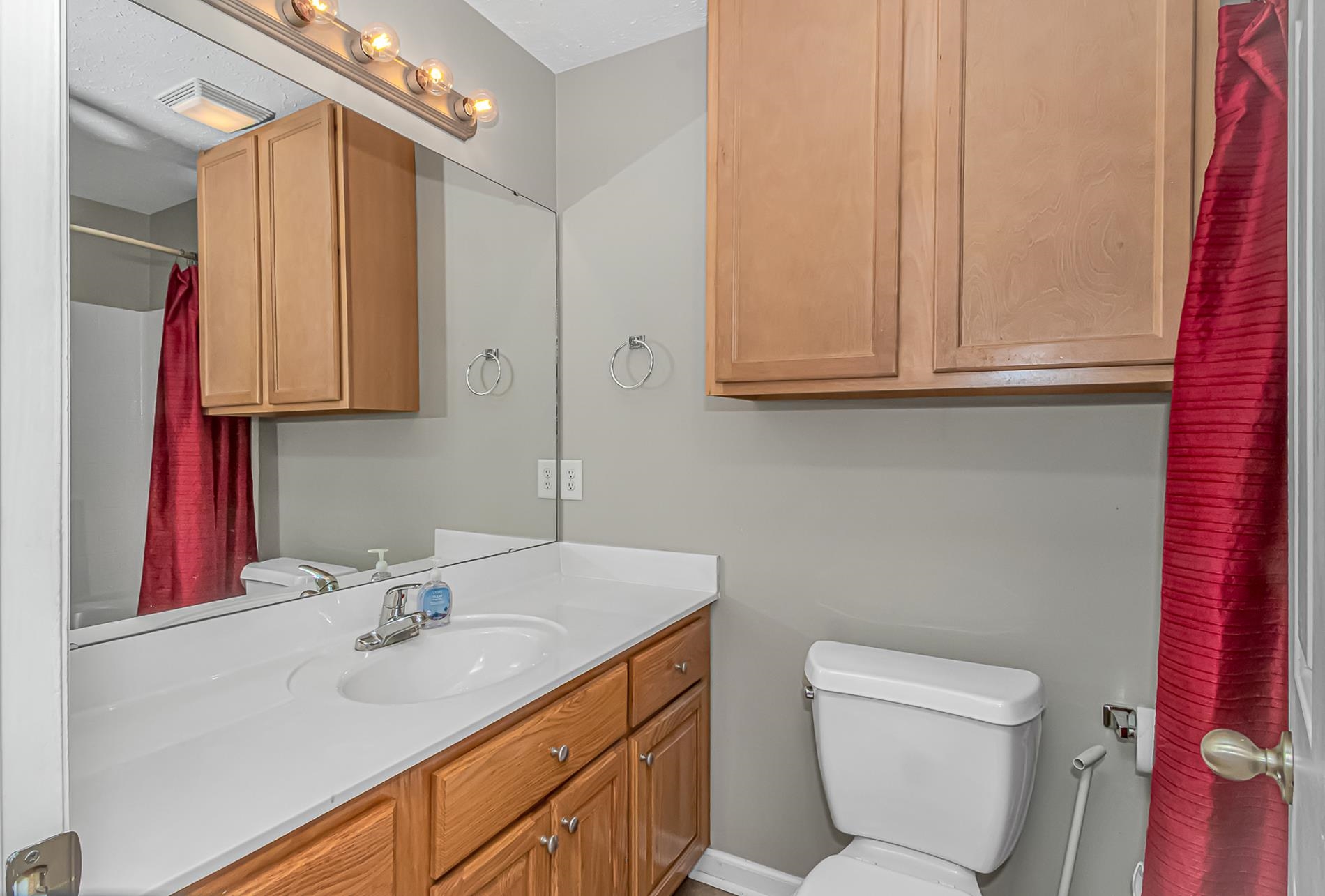 1012 Cadbury Court Conway, SC 29527 - Photo 31 of 40 Bathroom with curtained shower and vanity