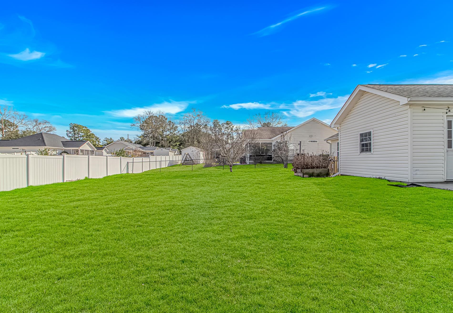 1012 Cadbury Court Conway, SC 29527 - Photo 33 of 40 Fenced backyard with a residential view
