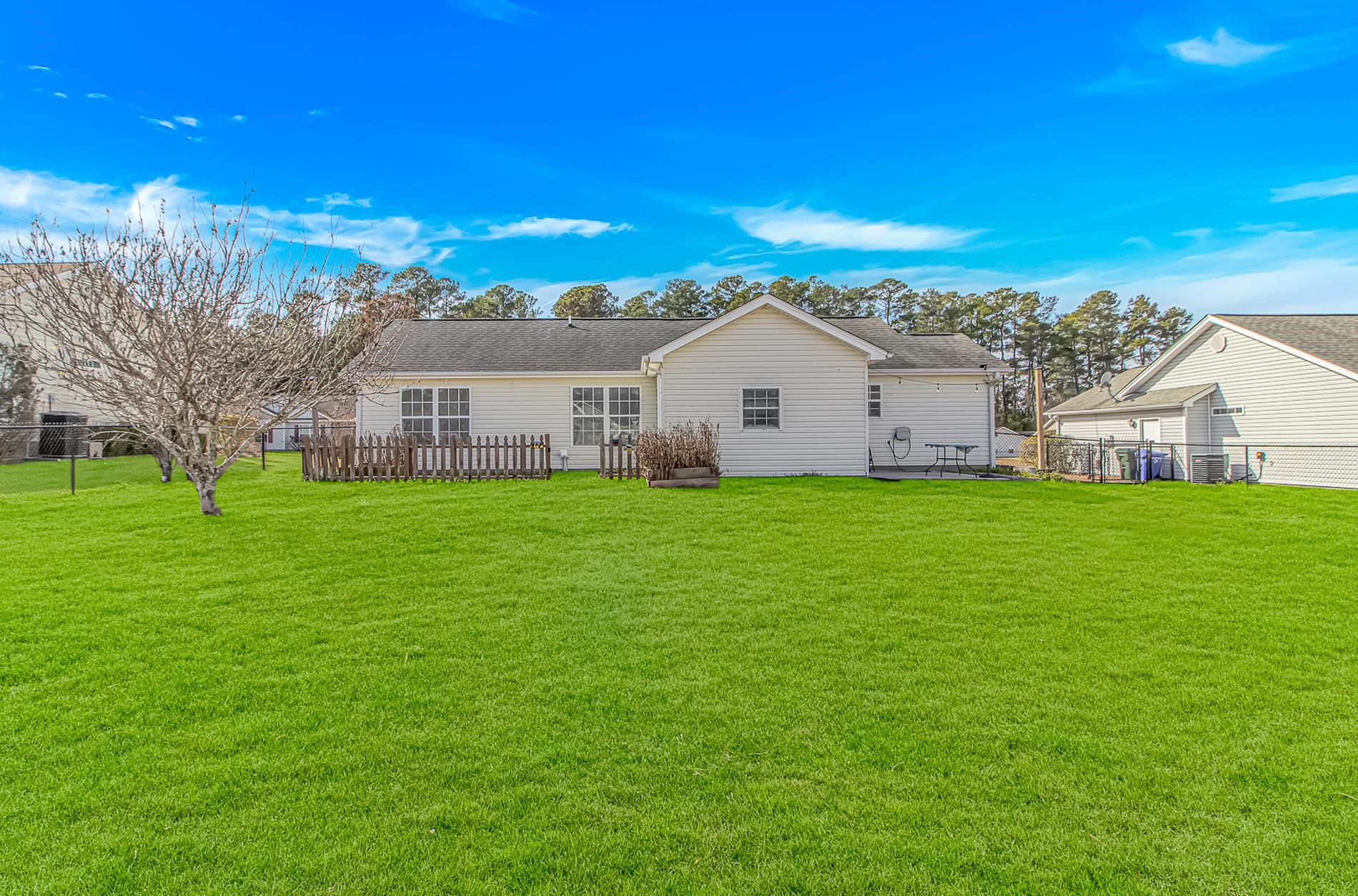1012 Cadbury Court Conway, SC 29527 - Photo 34 of 40 Rear view of property with a shingled roof