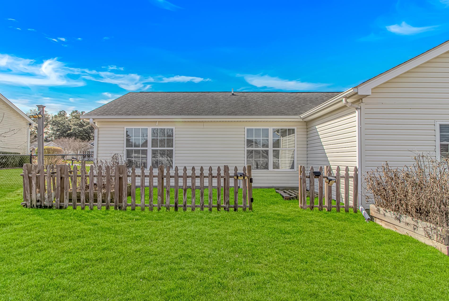 1012 Cadbury Court Conway, SC 29527 - Photo 36 of 40 Rear view of property featuring roof with shingles